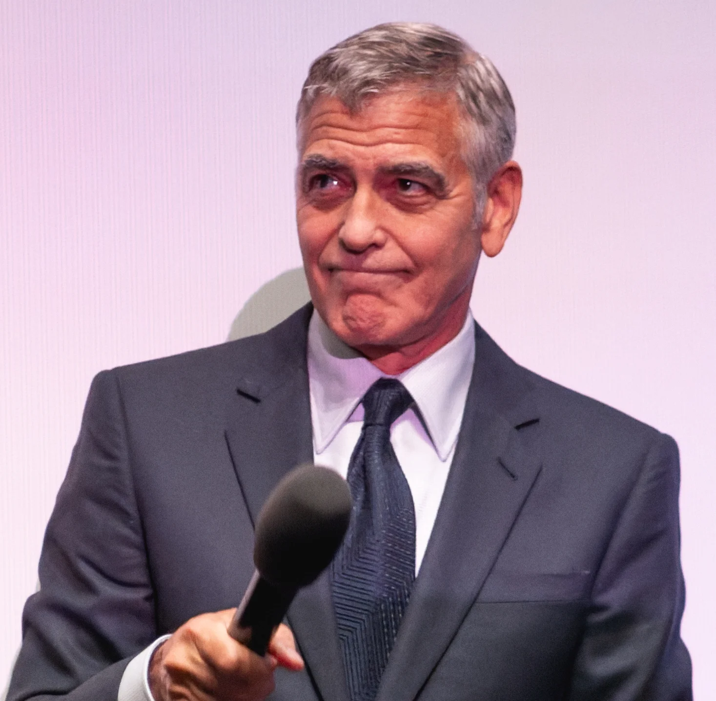 George Clooney, Hollywood Star, Walks with His Lifetime Achievement Award in Venice