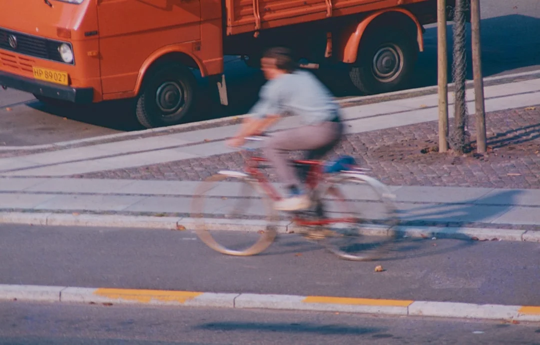 Strange Accident: Bee Sting Causes Truck to Fall on Cyclists' Path
