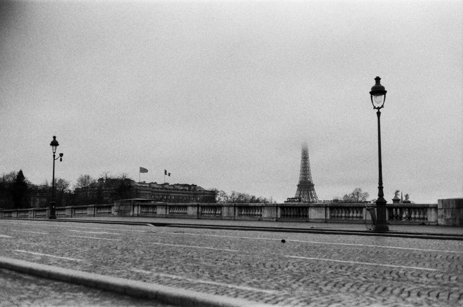 United States Flag Above the Eiffel Tower: Love or Madness?